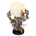 3D metal dragon claw lamp puzzle in stainless steel gripping a glowing orb, a 1000 piece model kit for adult builders