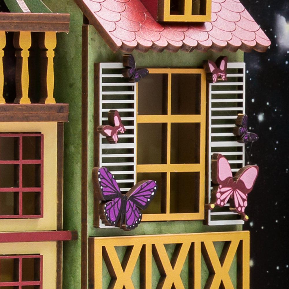 Alsatian timber house with yellow shutters and purple butterflies, DIY miniature book nook kit for shelf display