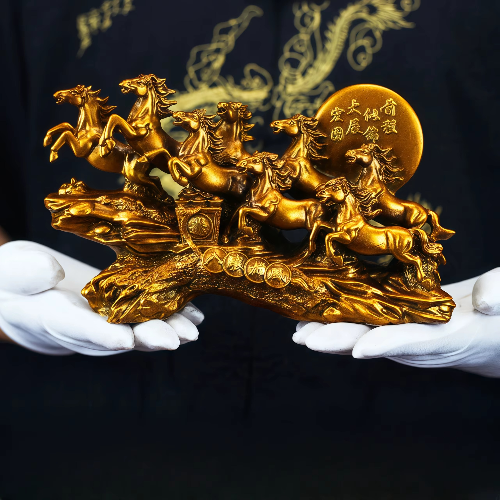 Gold eight horse feng shui ornament held for scale, a golden resin prosperity sculpture for a desk shelf or TV cabinet SKU_1754352092894_250