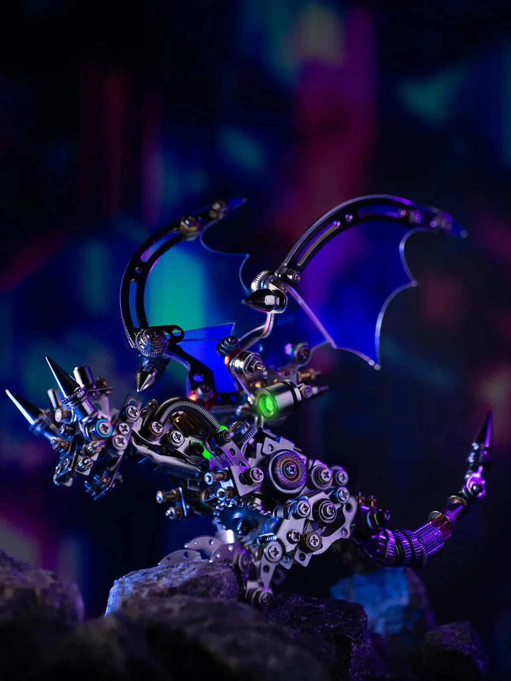 Blue winged metal dragon perched as a guardian display sculpture, a mechanical 3d metal puzzle for fantasy fans Blue
