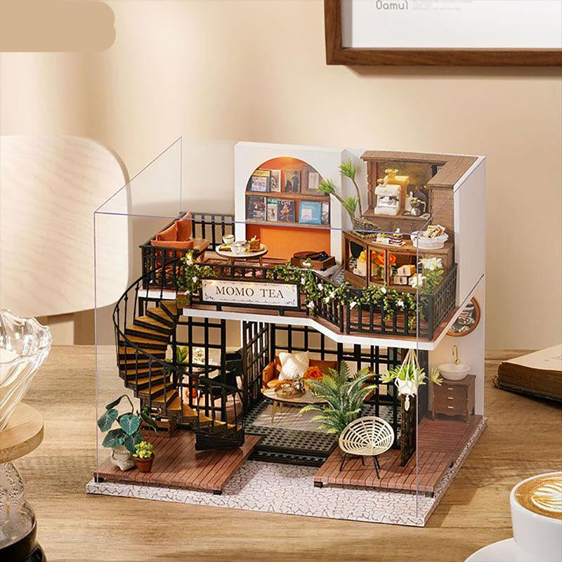 Forest teashop dollhouse kit in 1:24 scale, a woodland cafe miniature with warm LED light for adult crafters