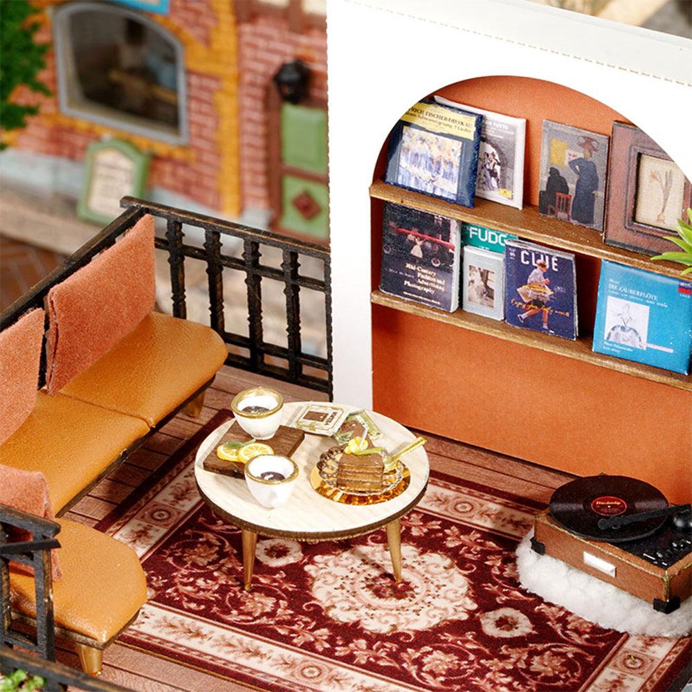1:24 scale dollhouse kit with music box and illustrated assembly guide for hobbyists and model makers 14 and up