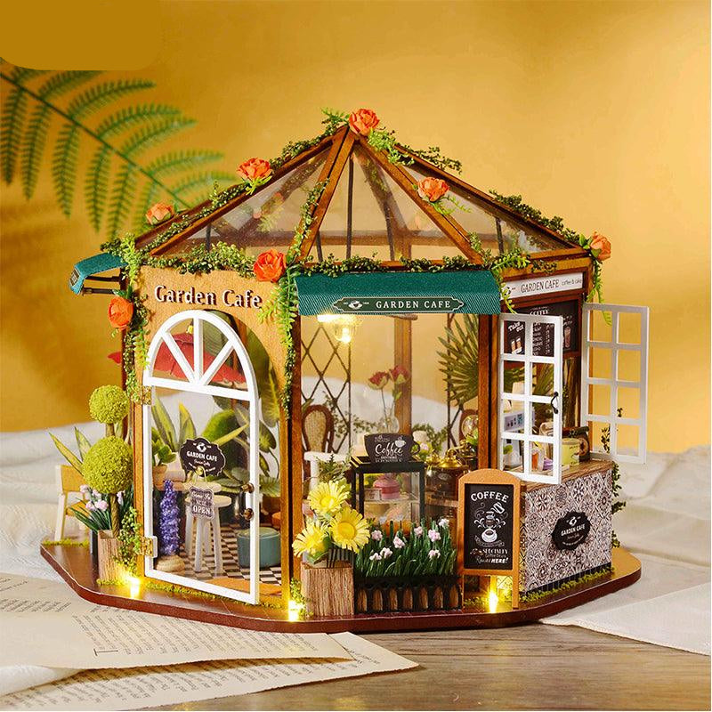 Detailed cafe interior with tiny tables and a counter, a DIY miniature dollhouse kit for hobby model builders