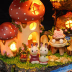 Warm LED mushroom houses lighting a nighttime woodland scene with bunny figures, a cozy miniature dollhouse craft kit for adults