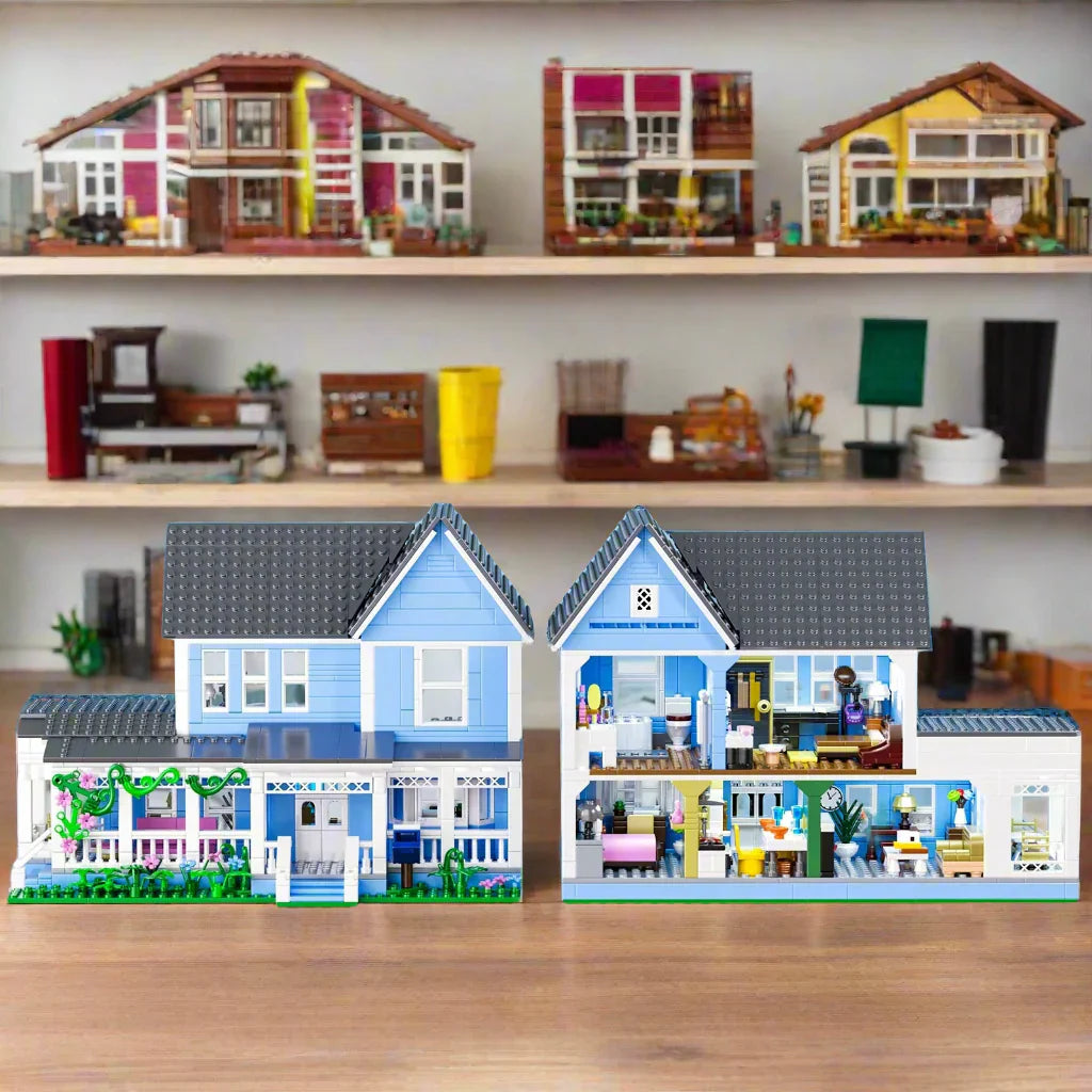 Open block house revealing detailed interior rooms and furniture, a Stars Hollow building set for display and collectors