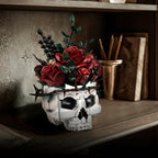 Gothic skull flower centerpiece styled on a bookshelf, a LEGO-compatible brick bouquet and desk decor for adult collectors