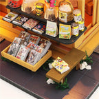 Miniature magazine and manga rack outside a tiny grocery store, a Japanese roombox craft kit for model makers and gifts