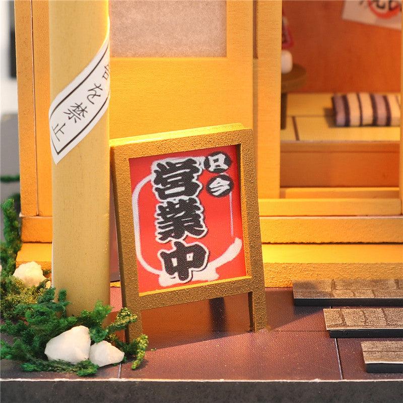 Little open shop sign at a miniature grocery store front, a 1:24 Japanese market building kit for miniature collectors