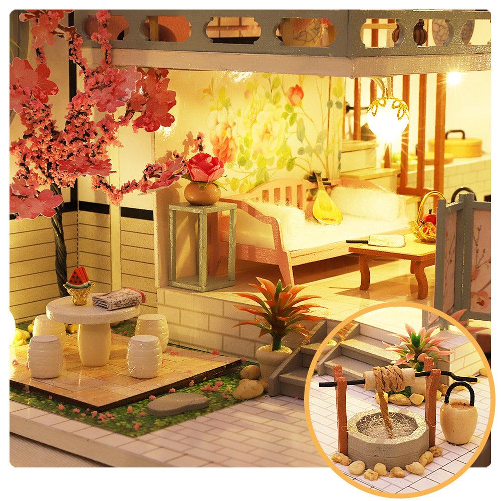 Miniature Chinese courtyard with cherry blossom tree and daybed lounge, a 1:24 pavilion dollhouse kit for shelf and desk decor