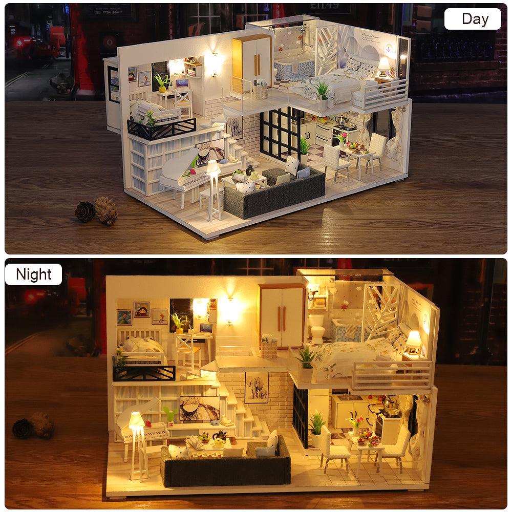 LED lit miniature dollhouse shown in day and warm night glow, a 1:24 scale model house build with music box for crafters