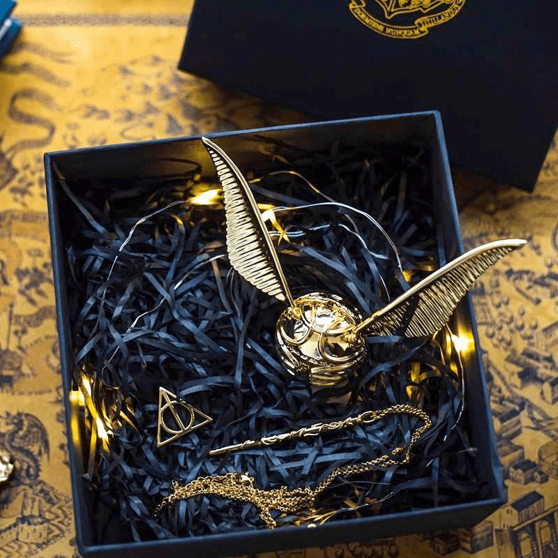 Gold snitch ring box gift set with a Deathly Hallows stand and fairy lights, a Harry Potter proposal keepsake box RNGBX1