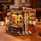 Assembled dollhouse chocolate store with LED lit shelves and a checkerboard floor, a miniature display piece for home decor