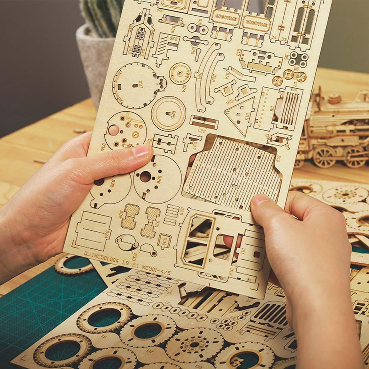Laser cut plywood parts that snap together with no glue, a 369 piece car model kit for relaxing screen free building