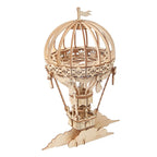 Wooden hot air balloon 3D puzzle kit assembled into a detailed plywood display model for teens and adult crafters
