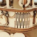 Intricate laser cut plywood gondola and basket of the wooden hot air balloon 3D puzzle with interlocking no glue pieces