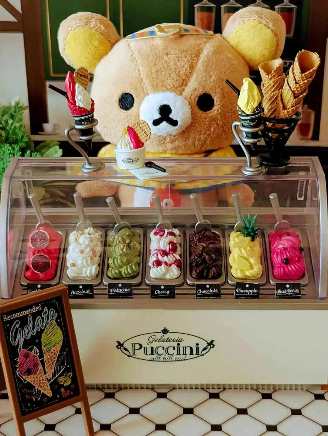 Italian gelateria miniature with a refrigerated display case and colorful gelato scoops for miniature food shelf displays
