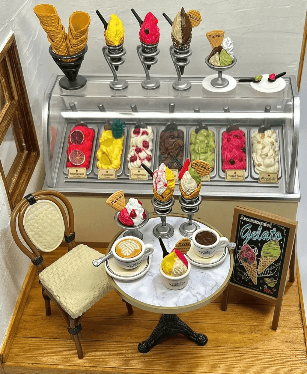 1:12 scale miniature dessert shop with sculpted ice cream scoops and serving tools for tiny food display collectors