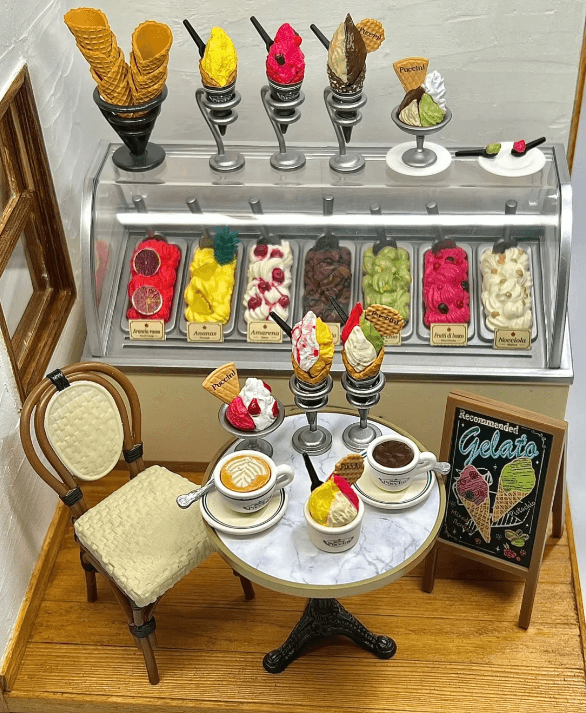 1:12 scale miniature dessert shop with sculpted ice cream scoops and serving tools for tiny food display collectors
