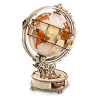 Illuminated globe 3D wooden puzzle glowing with warm LED light, a 180 piece vintage world map model kit for adults