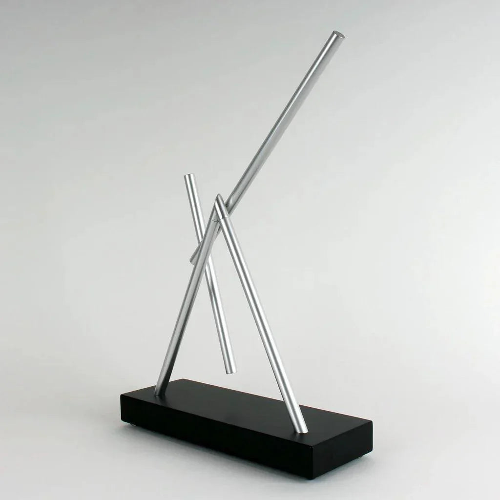 Stress relief kinetic desk toy with mesmerizing swinging motion on a Black base, a calming fidget for focused office work