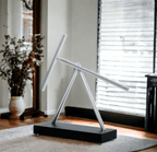 Perpetual motion desk sculpture gift for engineers, physics fans, and dads, a Black kinetic art piece for a work desk