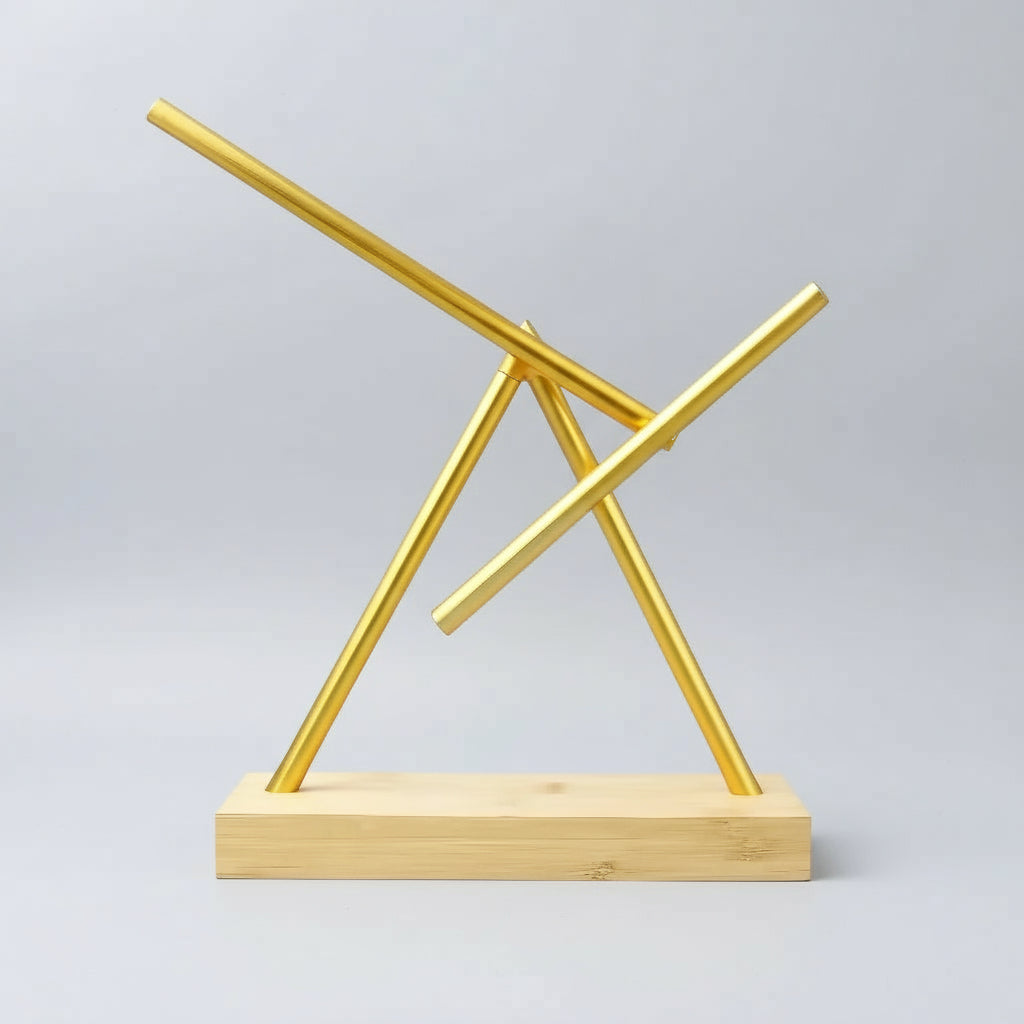 Swinging sticks kinetic sculpture in a Gold finish on a wood base, a perpetual motion desk piece for an executive office