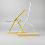 Perpetual motion swinging sticks available in Gold and Silver finishes, a Newton pendulum desk gift for engineers and fans