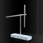 Perpetual motion swinging sticks sculpture with a White marble base, a mesmerizing kinetic desk toy for focused work