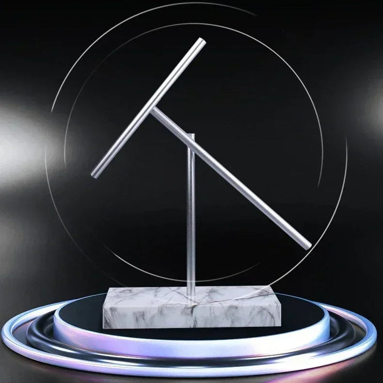 Iron Man 2 swinging sticks kinetic sculpture on a White marble base, a collector desk piece with hypnotic motion