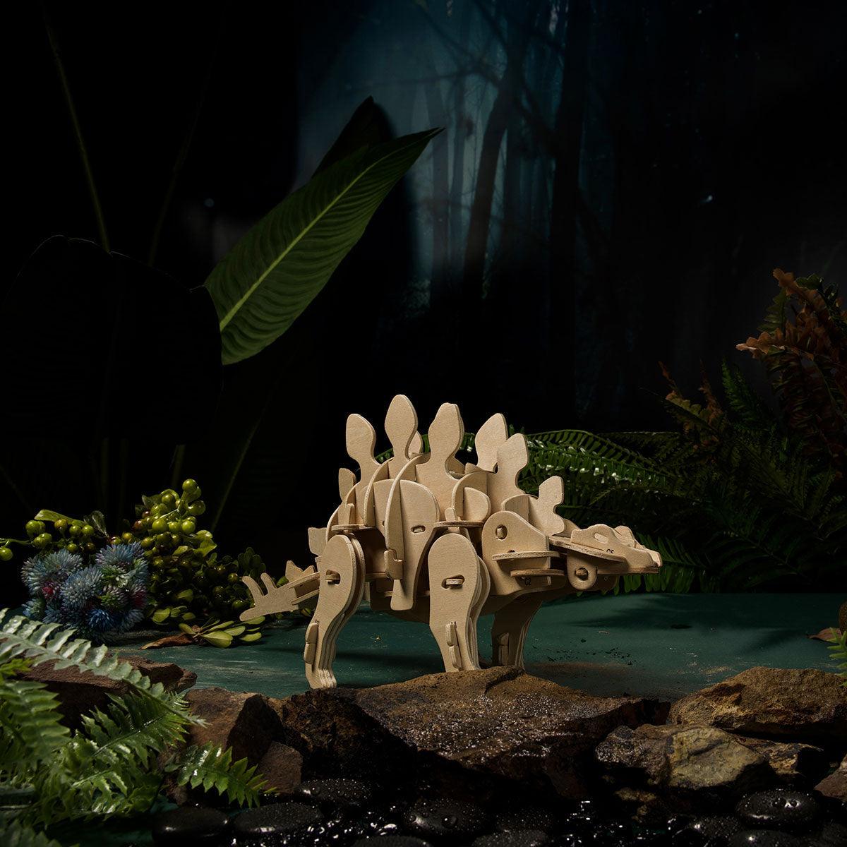 Handset controlled Stegosaurus with light sensor and realistic roar and stomp sounds for interactive dinosaur play
