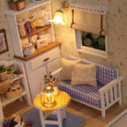 Warm LED lamps lighting a miniature cottage room with a music box and gingham sofa, a relaxing craft gift for adults and teens
