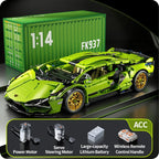 Buildable green RC racing car with a drive motor, servo steering motor and rechargeable battery for hands on remote play