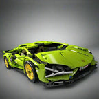 Green racing supercar model with an aero tail wing and low body, a 1:14 desk display piece built from interlocking blocks