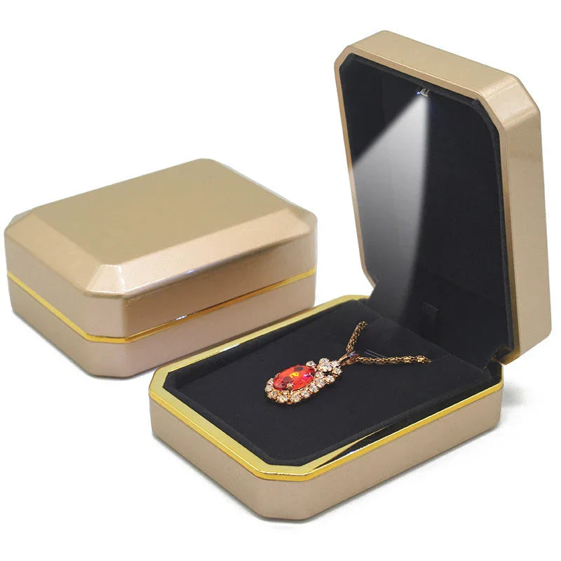 Gold LED necklace box with automatic light holding a pendant chain for an anniversary and birthday jewelry gift D-Gold