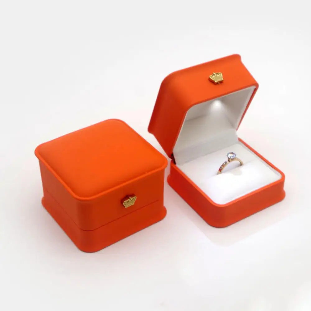 Orange LED ring box with a crown clasp and automatic light for an engagement proposal and an anniversary gift E-Orange-Ring