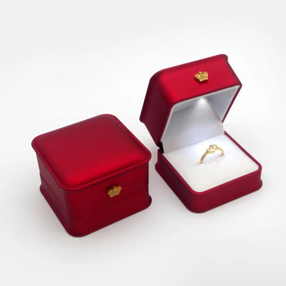 Red LED ring box with a crown clasp and a lit white cushion for a marriage proposal and a wedding ring gift E-Red-Ring