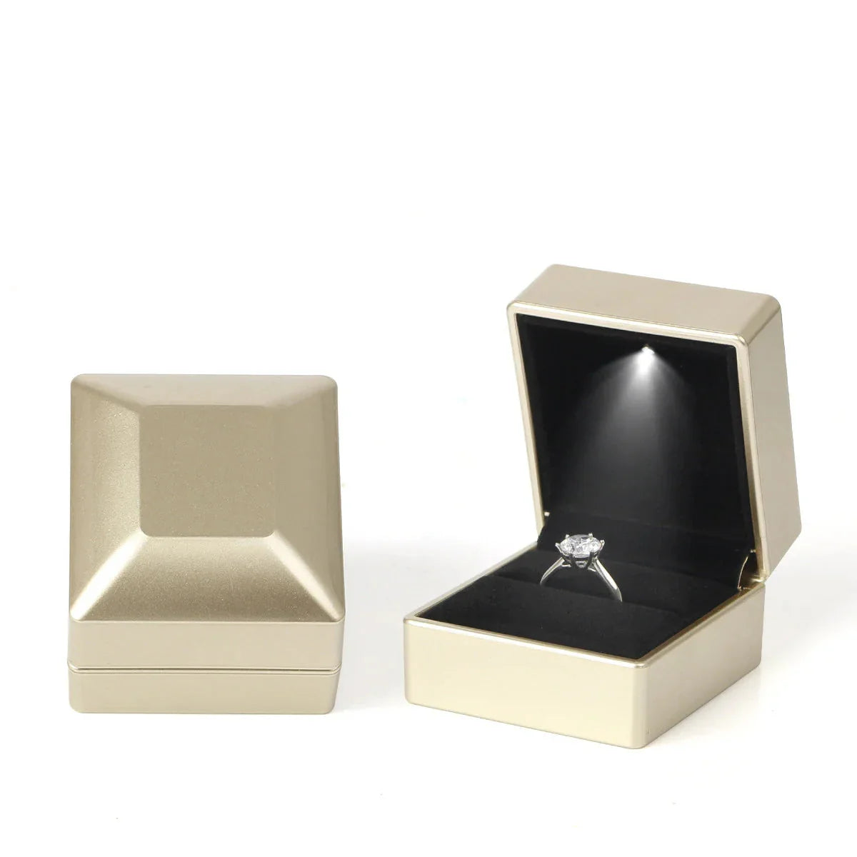 Gold LED ring box with an automatic spotlight and soft velvet slot for a luxury engagement and anniversary gift C-Gold