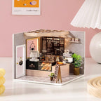 Assembled coffee shop miniature styled as cozy desk and shelf decor, a rewarding wooden craft kit and gift for coffee lovers