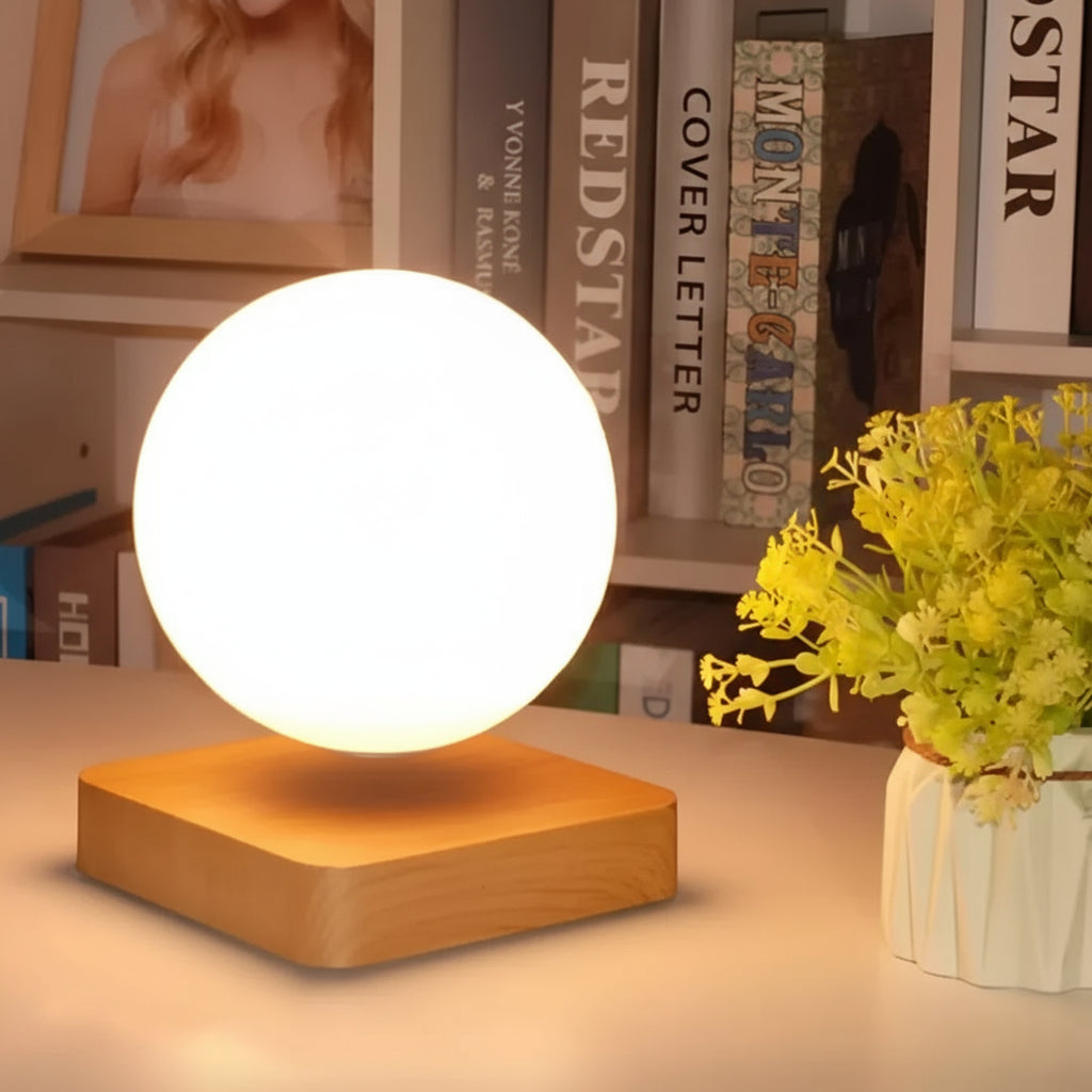Floating moon globe lamp with soft warm LED glow styled as living room and home office desk decor for shelves