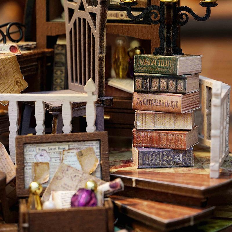 Magic House miniature model kit with candlelit library of tiny storybooks, a whimsical illuminated wooden build for adult crafters