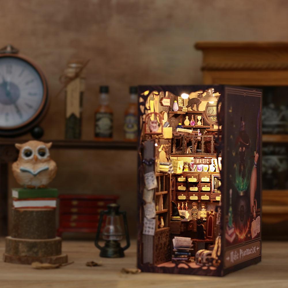 Miniature wizard apothecary book nook with glowing shelves of potion bottles, a lit bookshelf diorama and decor for readers Magic Pharmacist