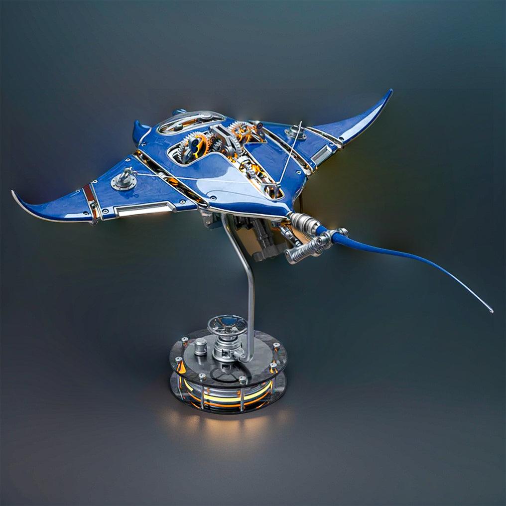 Manta ray metal desk sculpture with kinetic wings and soft LED glow for an ocean themed office accent