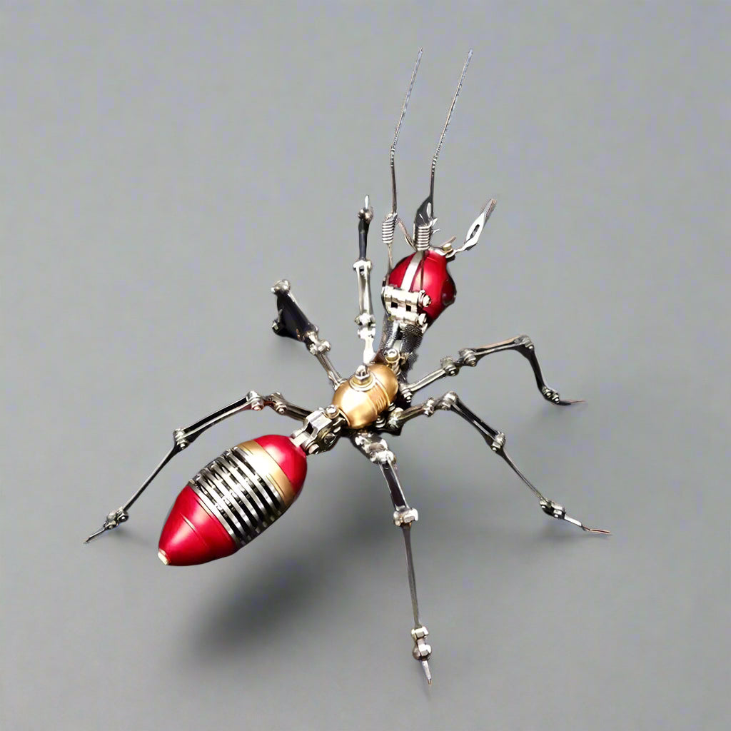 Mechanical 3D metal ant puzzle with a red stainless steel body and posable legs for adult model builders and desk decor Red version.