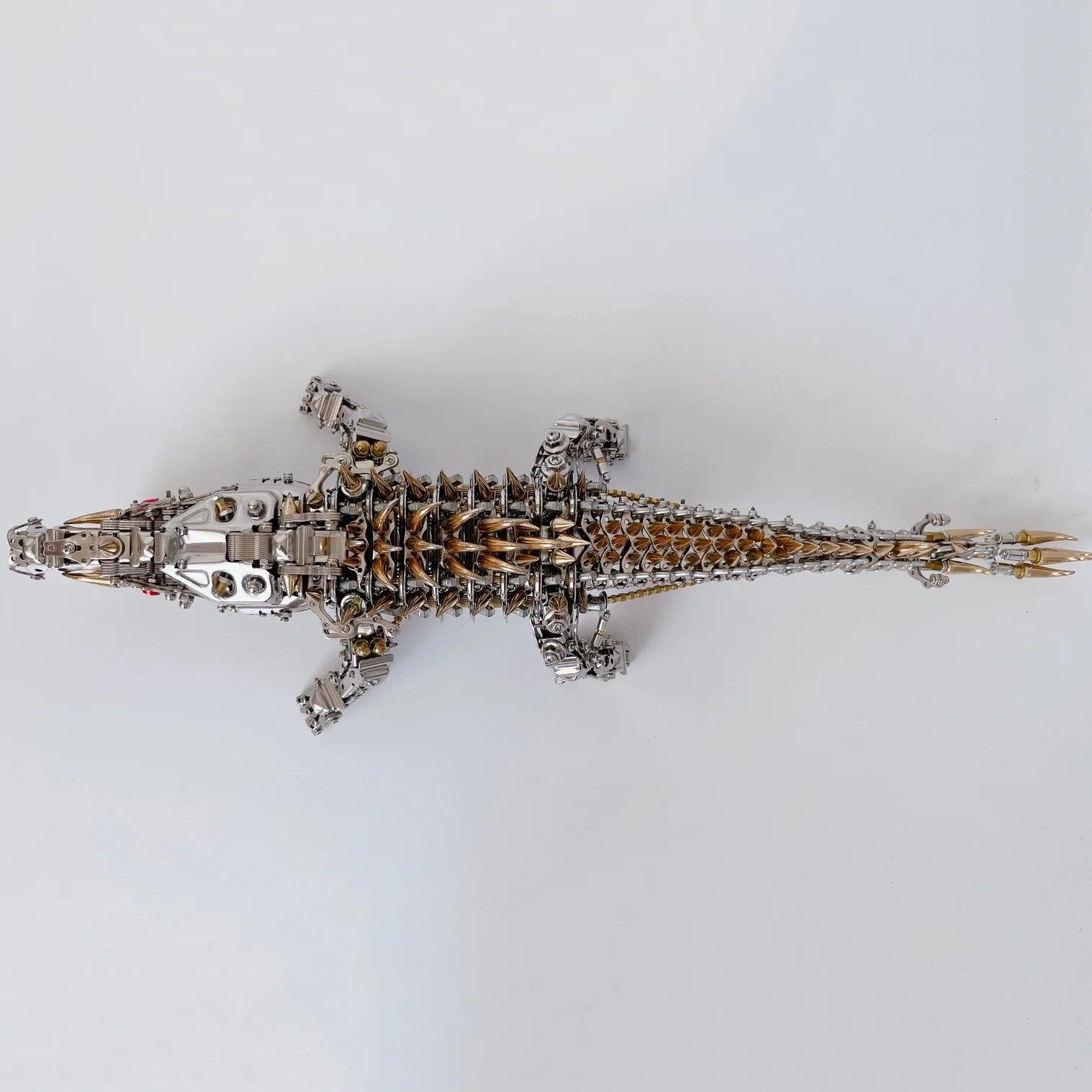 Articulated stainless steel crocodile model with a geared spine, an intermediate metal kit for hobbyists and collectors