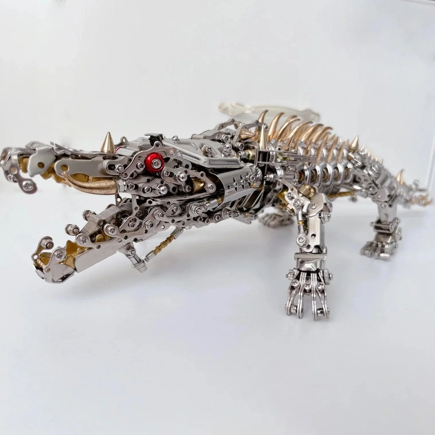 Steampunk metal crocodile desk centerpiece with polished silver finish and gold accents for industrial home decor