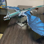 Ice toned mechanical dragon model displayed as desk decor, an articulated building blocks kit for adult fantasy collectors Frost Wyrm