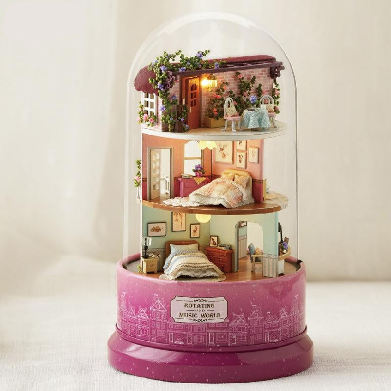Meet at Corner three level miniature dollhouse kit under a glass dome with LED lights and a rotating music box base
