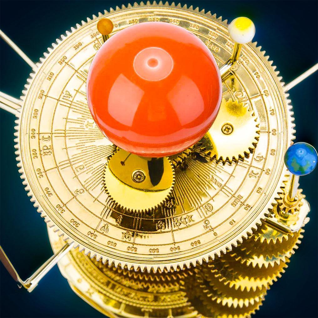 Graduated dial and painted planet spheres on a metal orrery, an educational astronomy model for teachers and space fans
