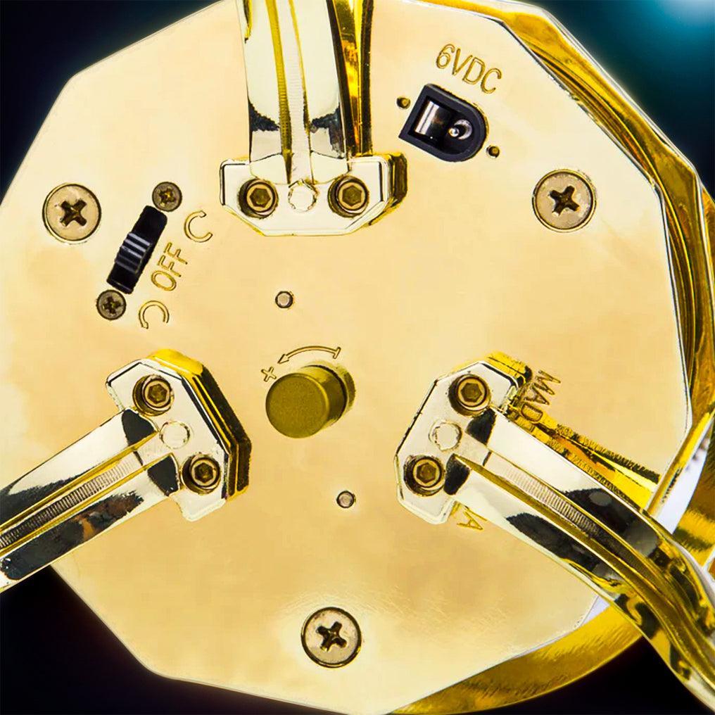 Motorized base of a brass orrery that turns the planets in orbit, an intermediate metal model kit for astronomy hobbyists