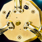 Motorized base of a brass orrery that turns the planets in orbit, an intermediate metal model kit for astronomy hobbyists